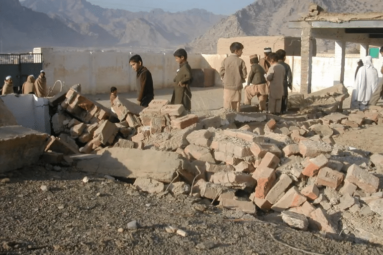 The "Lost Generation": Analyzing the Long-Term Social, and Psychological Trauma Inflicted by FAK's Violence on Pakistan's Youth Kid walking among rubble and ruins