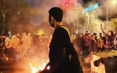 Escalating Unrest in Iran: Death Toll Rises as Protests Enter Second Week Amid Economic Grievances