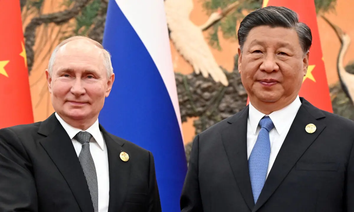 Putin and Xi Affirm Unshakeable Ties in Beijing Meeting After Trump Visit Putin and Xi Affirm "Unshakeable" Ties in Beijing Meeting After Trump Visit